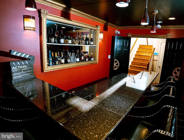 bar with stairs and ornamental molding