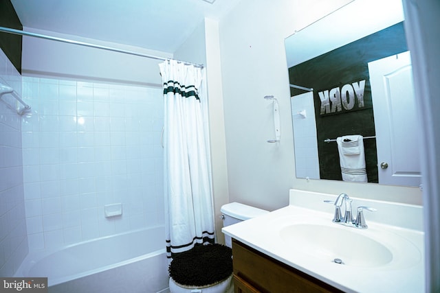 bathroom featuring shower / bath combo, vanity, and toilet