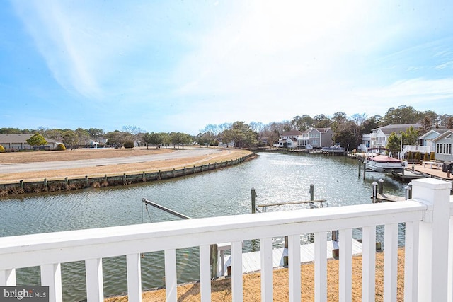 view of water feature with a dock