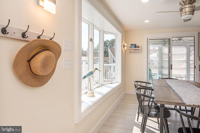 dining room with light wood-style floors, recessed lighting, baseboards, and a ceiling fan