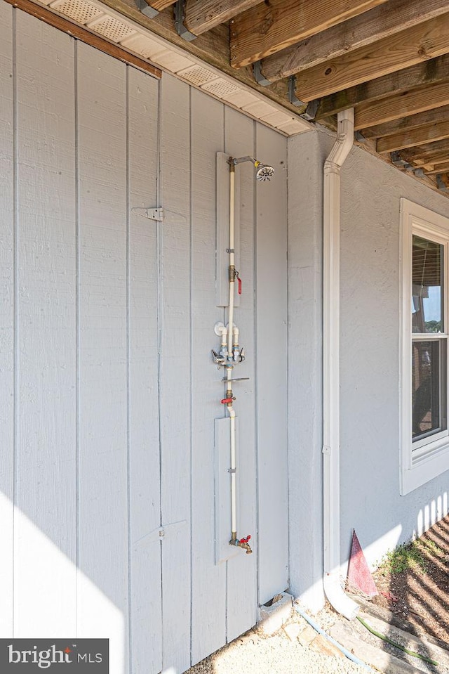 doorway to property with board and batten siding