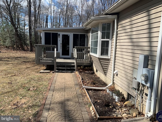 exterior space featuring a sunroom