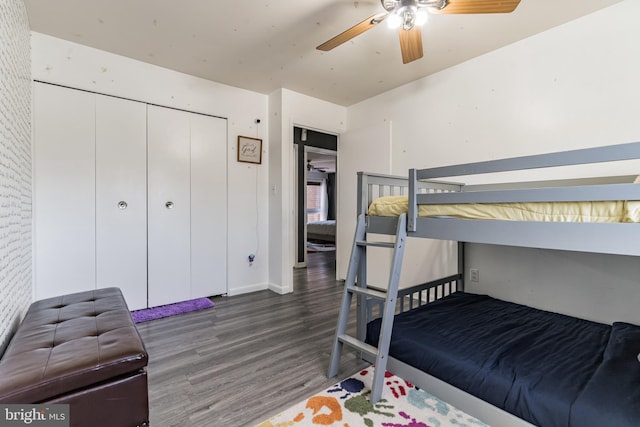 bedroom featuring a ceiling fan and wood finished floors