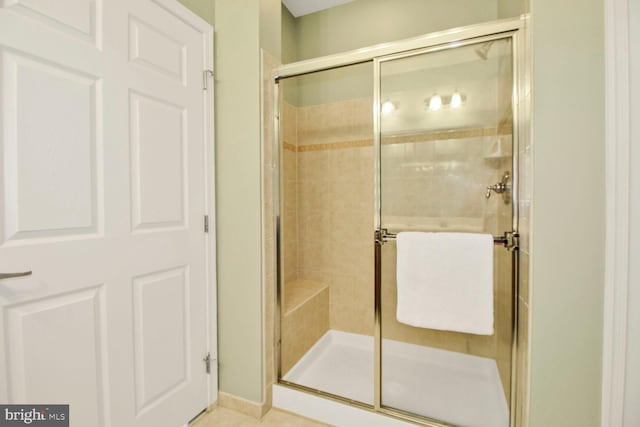 full bathroom with a shower stall