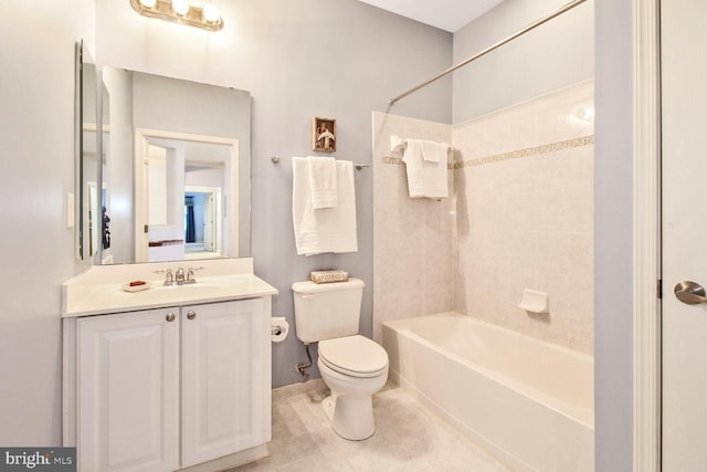 bathroom with tile patterned floors, shower / washtub combination, toilet, and vanity