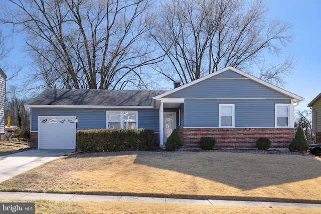 ranch-style home featuring a garage, driveway, and brick siding