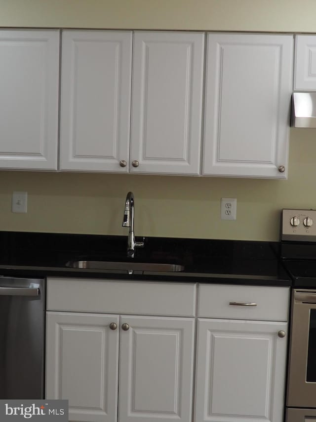 5711 Crownleigh Ct, Burke, VA 22015 - kitchen featuring electric range, a sink, stainless steel dishwasher, and white cabinetry