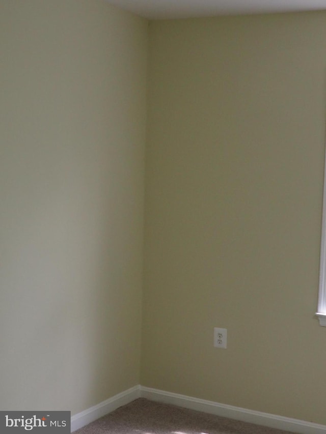 5711 Crownleigh Ct, Burke, VA 22015 - empty room with light colored carpet and baseboards