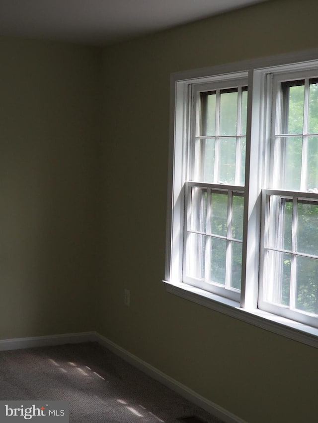 5711 Crownleigh Ct, Burke, VA 22015 - spare room featuring plenty of natural light, carpet floors, and baseboards