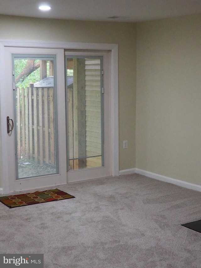 5711 Crownleigh Ct, Burke, VA 22015 - doorway featuring carpet flooring, baseboards, and recessed lighting
