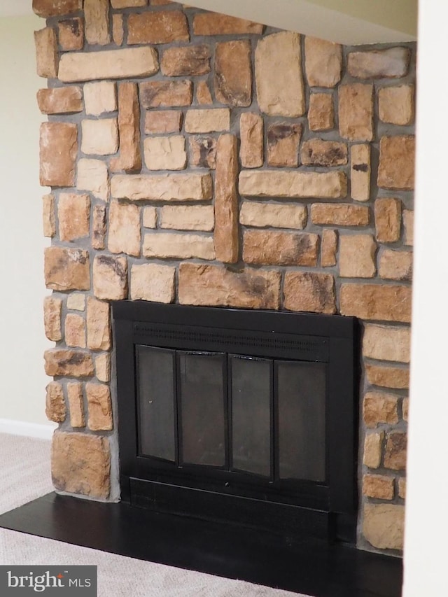 5711 Crownleigh Ct, Burke, VA 22015 - detailed view of a fireplace and baseboards