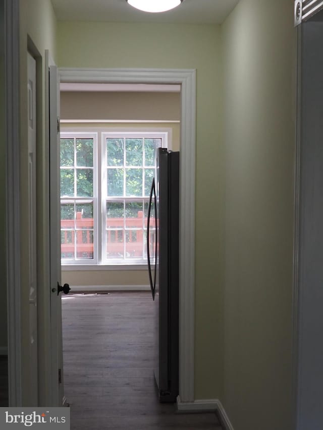 5711 Crownleigh Ct, Burke, VA 22015 - hall featuring wood finished floors and baseboards