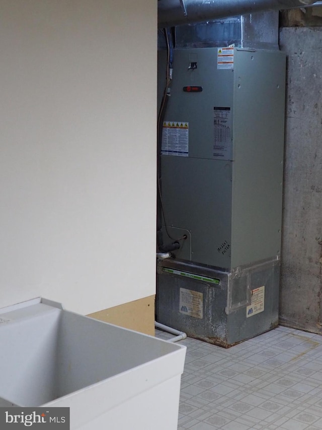 5711 Crownleigh Ct, Burke, VA 22015 - utilities featuring heating unit and a sink