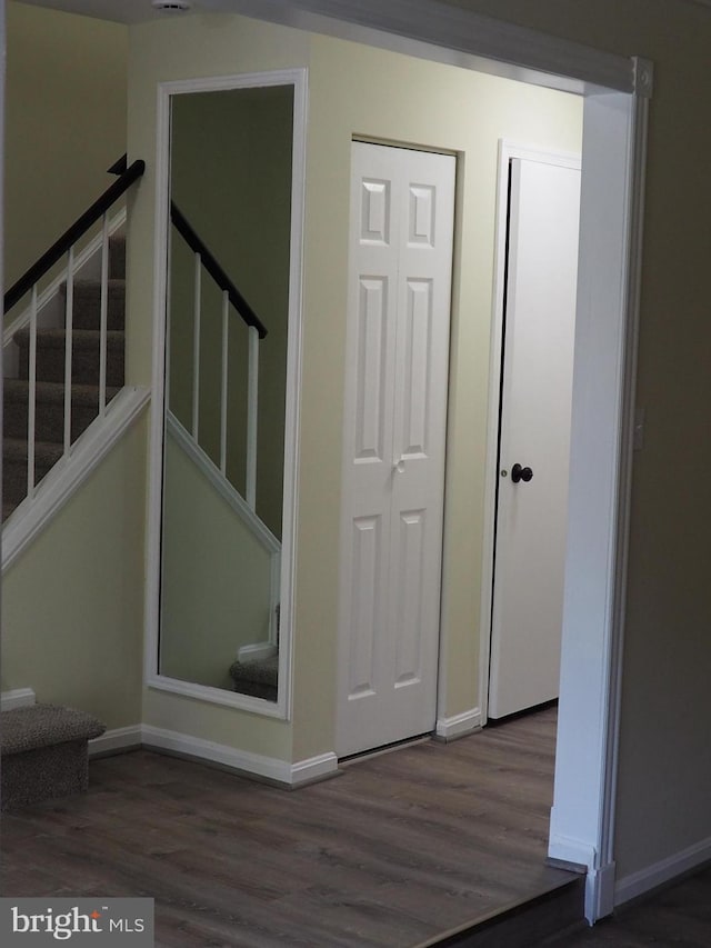 5711 Crownleigh Ct, Burke, VA 22015 - staircase featuring wood finished floors and baseboards