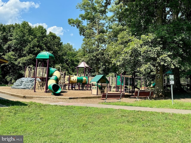 communal playground with a lawn