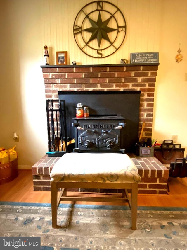 room details with baseboards and wood finished floors