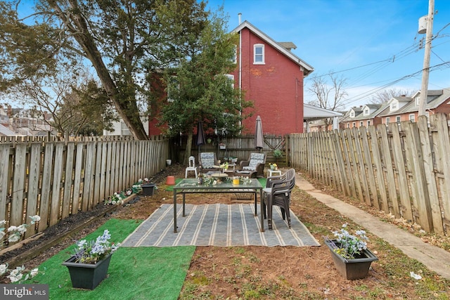 view of patio featuring a fenced backyard