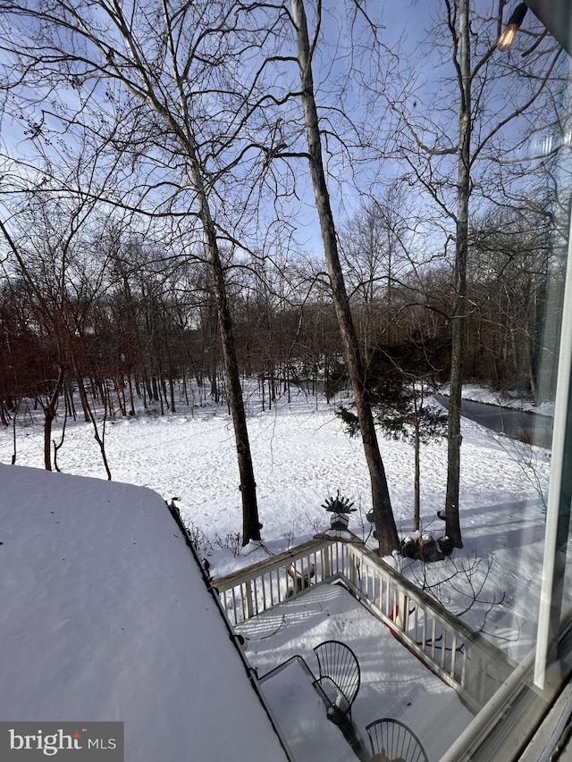 view of snow covered deck