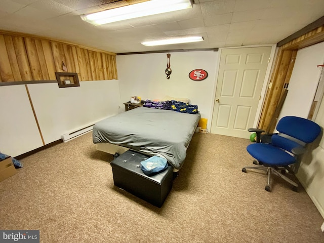 bedroom featuring carpet floors and baseboard heating