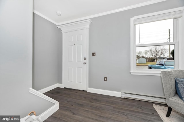 foyer entrance with ornamental molding, wood finished floors, baseboards, and a baseboard radiator