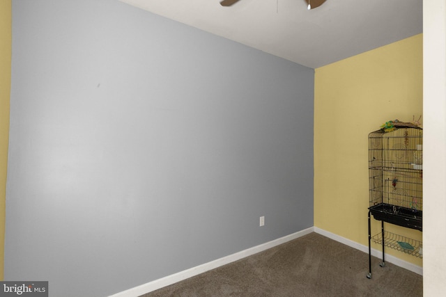 unfurnished living room with baseboards, carpet floors, and a ceiling fan