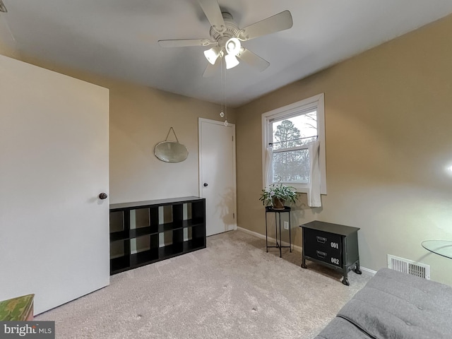 carpeted bedroom with visible vents and baseboards