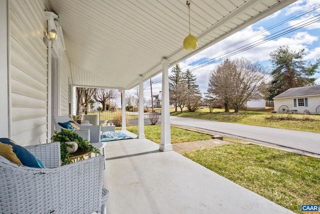 view of patio featuring fence