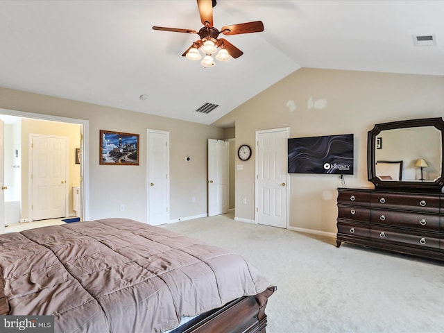 bedroom featuring vaulted ceiling, baseboards, visible vents, and light colored carpet