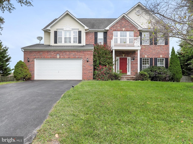 view of front of home featuring aphalt driveway, brick siding, a balcony, and a front lawn