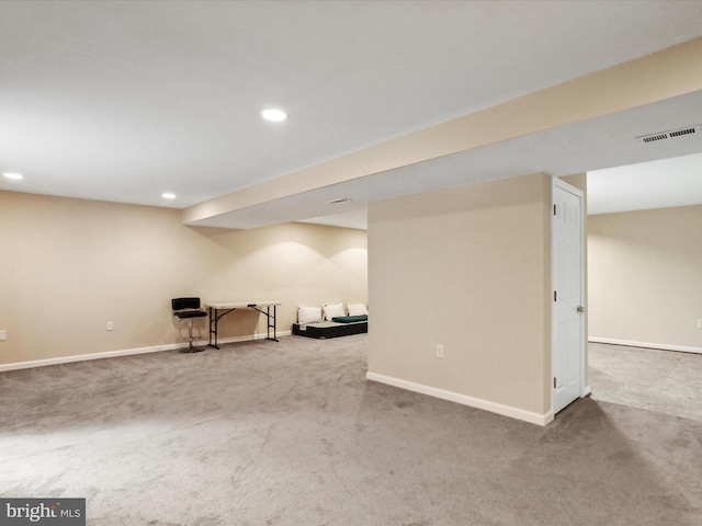 finished basement with baseboards, carpet flooring, visible vents, and recessed lighting