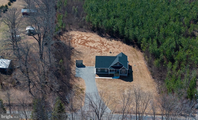 drone / aerial view with a forest view