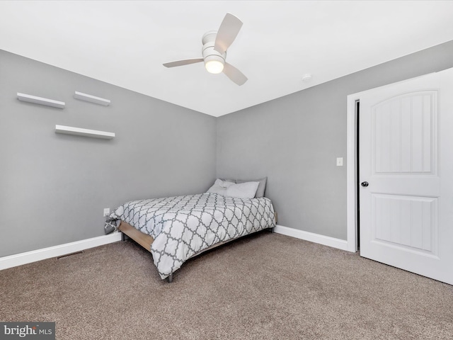 bedroom with carpet flooring, baseboards, and ceiling fan