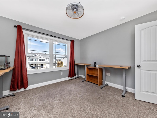 home office featuring carpet flooring and baseboards