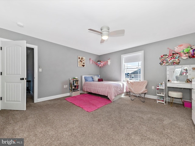 bedroom with carpet flooring, baseboards, and ceiling fan