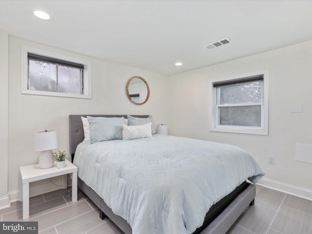 bedroom featuring recessed lighting, visible vents, and baseboards