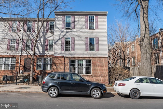 multi unit property with brick siding