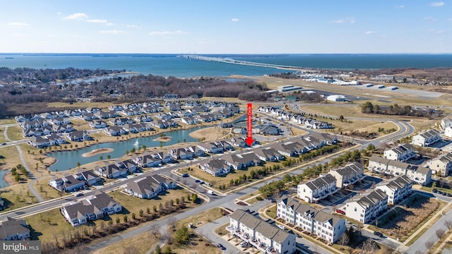 bird's eye view featuring a residential view and a water view