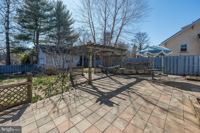 view of patio / terrace with fence and a pergola