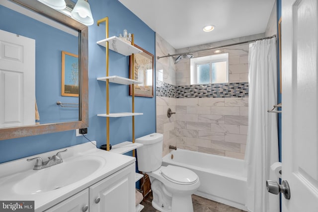 bathroom with toilet, vanity, and shower / bathtub combination with curtain