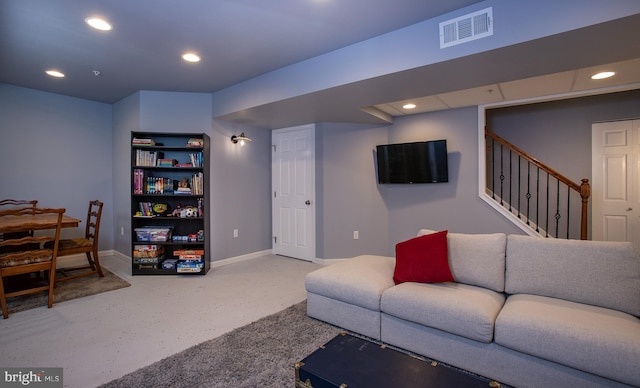 living room featuring recessed lighting, visible vents, baseboards, and stairway