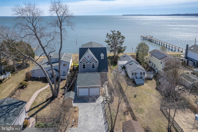 bird's eye view with a water view and a residential view