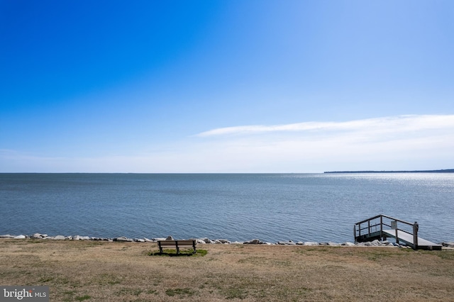 view of water feature with a dock