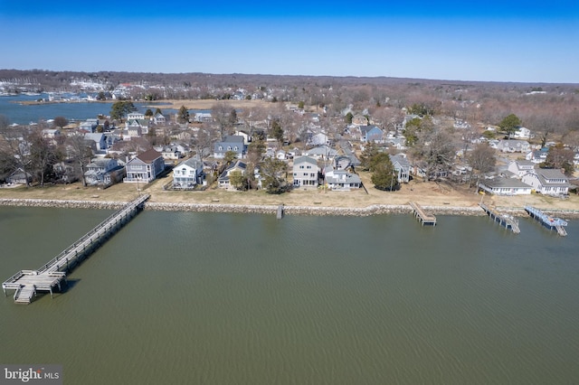 aerial view featuring a water view and a residential view