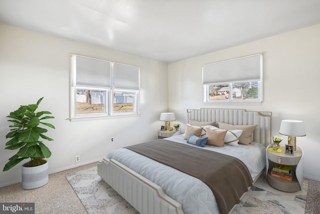 bedroom featuring baseboards