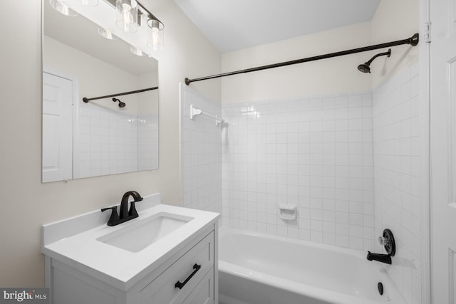 full bathroom featuring bathtub / shower combination and vanity