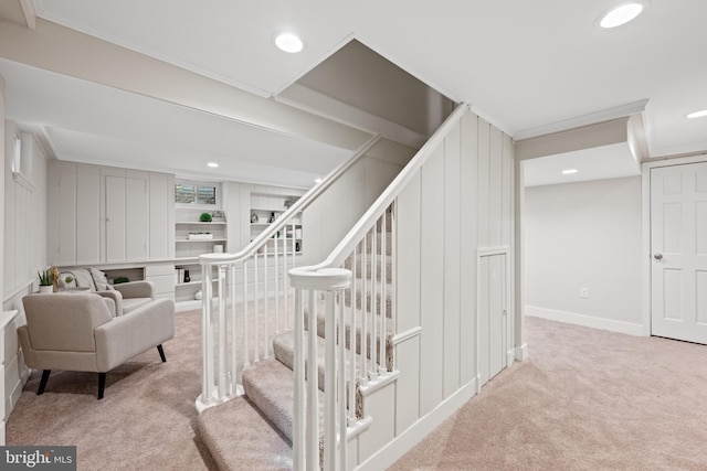 stairs featuring recessed lighting, crown molding, baseboards, and carpet floors