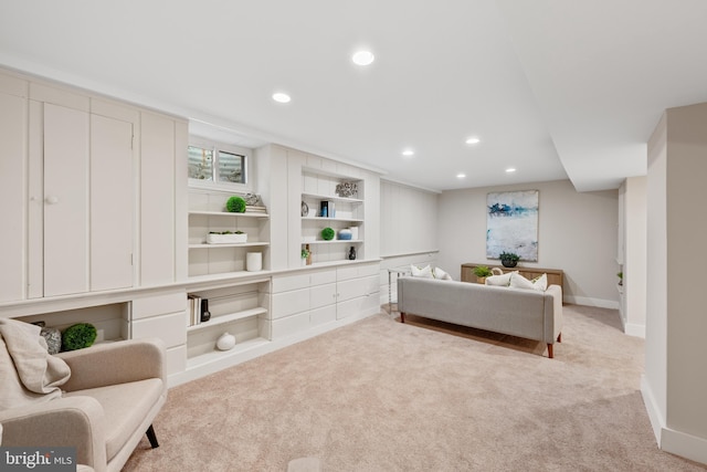 bedroom with recessed lighting, light colored carpet, and baseboards