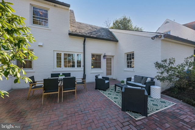 view of patio / terrace featuring an outdoor living space and outdoor dining area