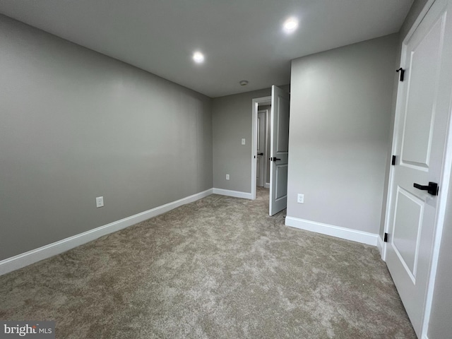 interior space with baseboards, carpet flooring, and recessed lighting