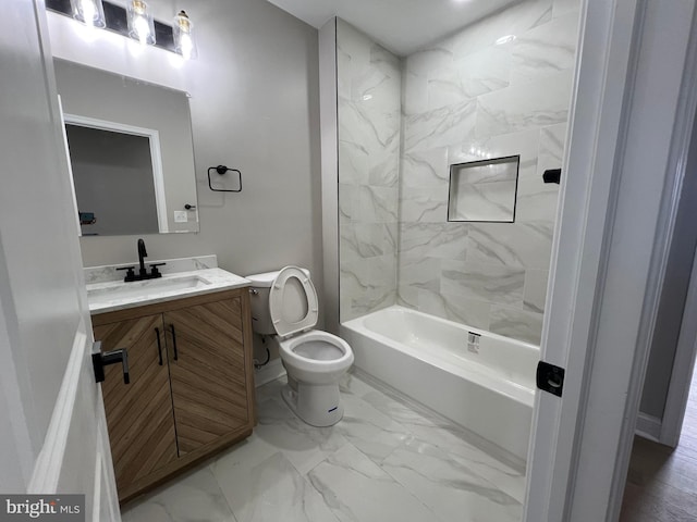 bathroom with toilet, marble finish floor, shower / tub combination, and vanity